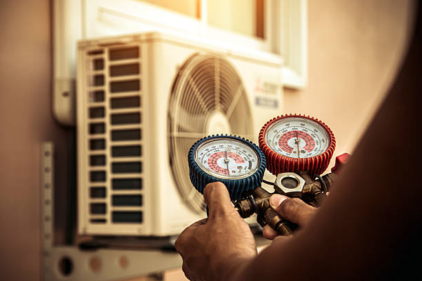 Professional Air Conditioning Service technician working in Pittsburg, CA